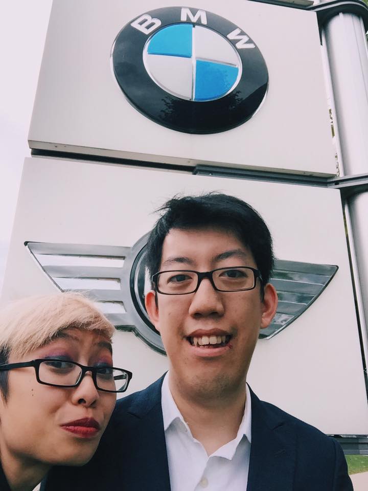 Michelle and Andy stand in front of the BMW sign to the BMW museum, where Andy picked up his BMW M4.